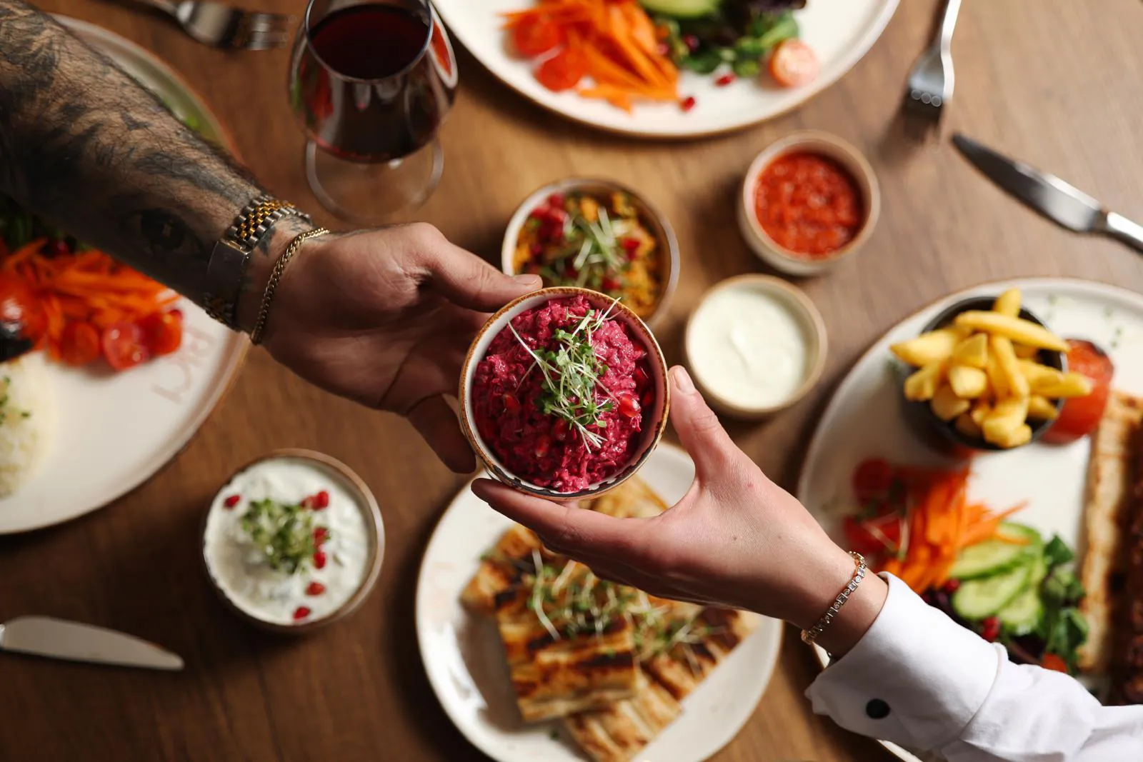 Beetroot meze passed across the table